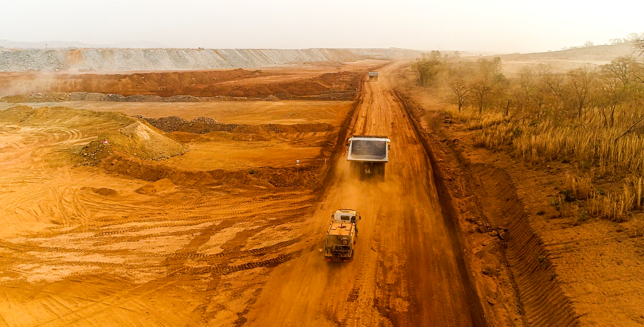 Trucks driving on the road near the mine in Senegal
