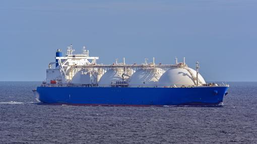 Liquefied natural gas (LNG) tanker underway in high seas image