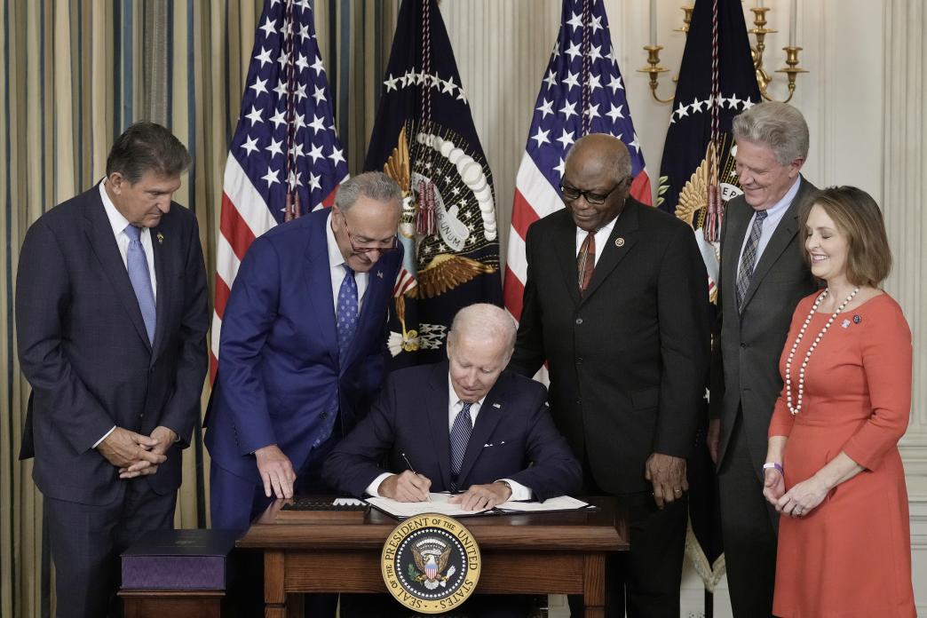 Joe Biden signs the Inflation Reduction Act.